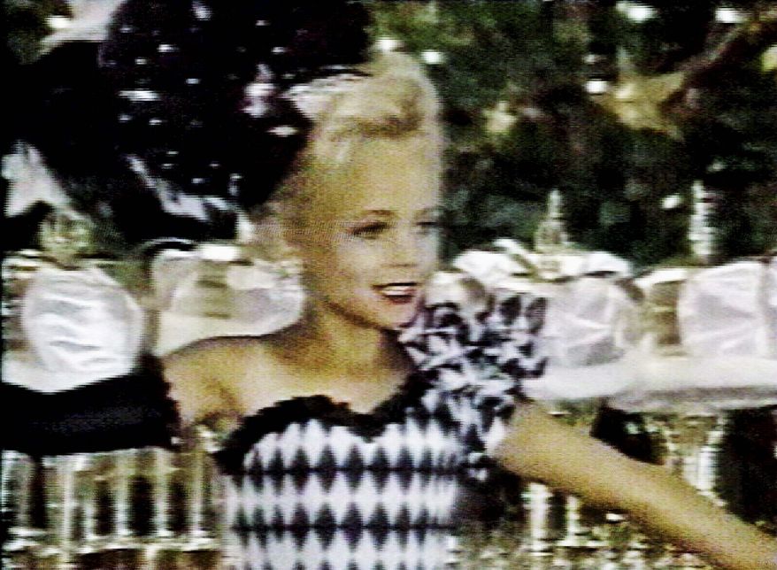 JonBenet Ramsey performs during a beauty pageant in an undated photo taken from a family video. (Associated Press)
