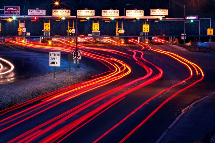 ASSOCIATED PRESS
Traffic slows for the York tolls on the Maine Turnpike in York, Maine, on Saturday. Tolls went up this week for motorists using the turnpike, a year earlier than the Maine Turnpike Authority had anticipated.