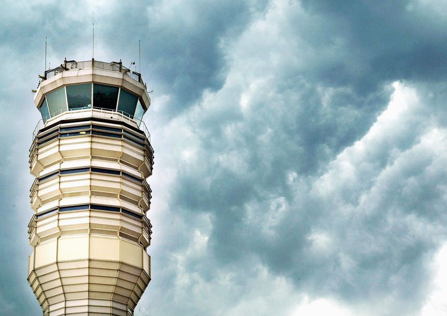 Clouds gather over the control tower at Ronald Reagan Washington National Airport in Arlington. (Getty Images file)