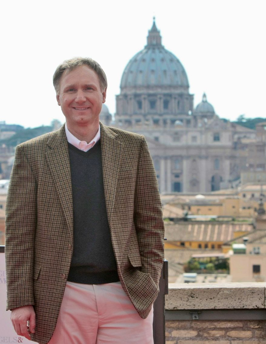 Novelist Dan Brown poses during a photo call for the world premiere of the movie "Angels & Demons" in Rome in 2009. (AP Photo/Andrew Medichini)