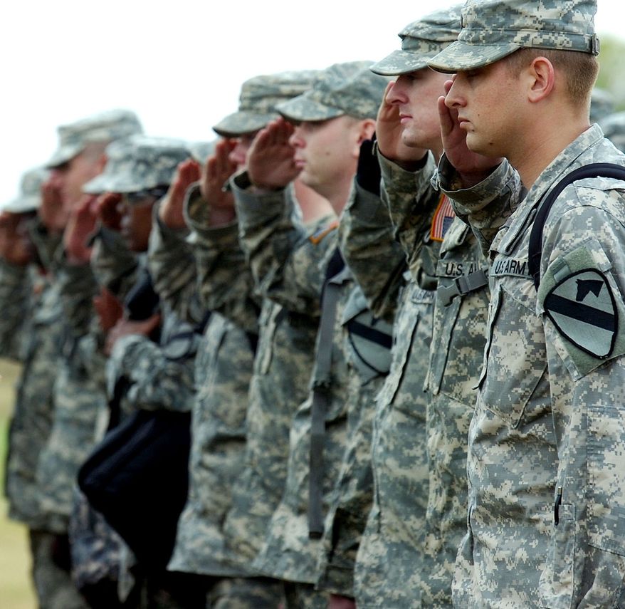 **FILE** In a Dec. 11, 2007 file photo, soldiers from the 1st Cavalry Division and 13th Sustainment Command stand in formation during a homecoming ceremony at Fort Hood, Texas. (Associated Press)