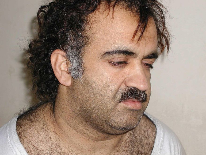 **FILE** Khalid Sheikh Mohammed, the alleged Sept. 11 mastermind, is seen shortly after his capture during a raid in Pakistan in March 2003. (Associated Press)