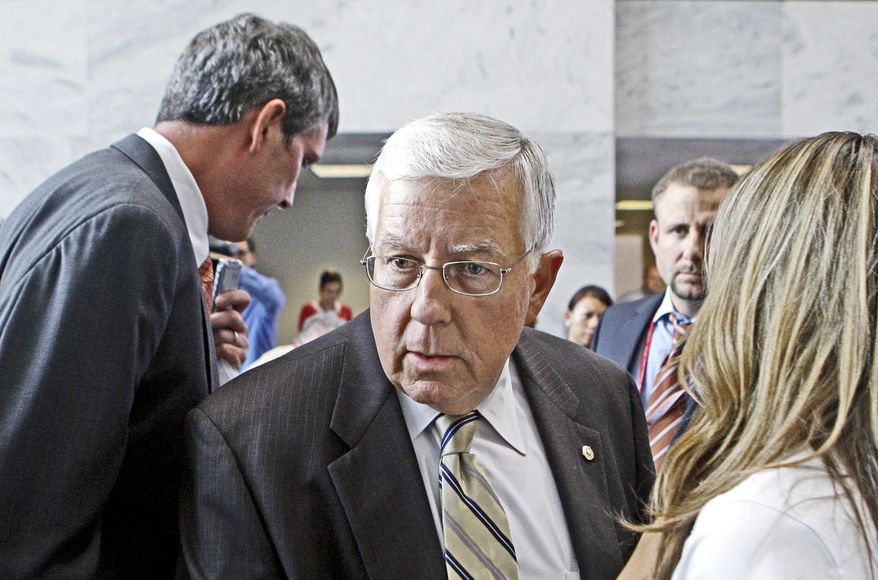 ** FILE ** Sen. Michael B. Enzi, Wyoming Republican. (Associated Press)