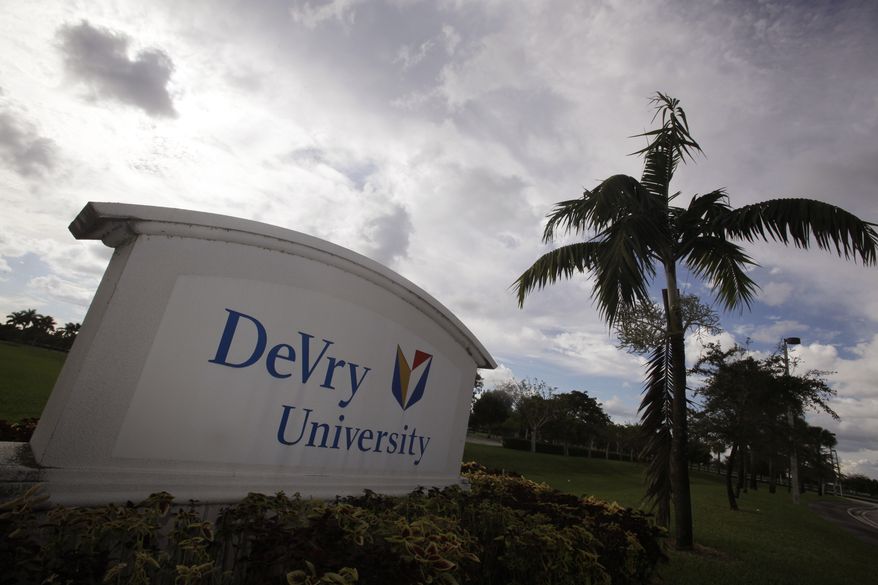 ASSOCIATED PRESS This Nov. 24, 2009 photo, shows the entrance to the DeVry University in Miramar, Fla. Students aren't the only ones benefiting from the billions of new dollars Washington is spending on college aid for the poor. An Associated Press analysis shows surging proportions of both low-income students and the recently boosted government money that follows them are ending up at for-profit schools, from local career colleges to giant publicly traded chains such as the University of Phoenix, Kaplan and Devry.