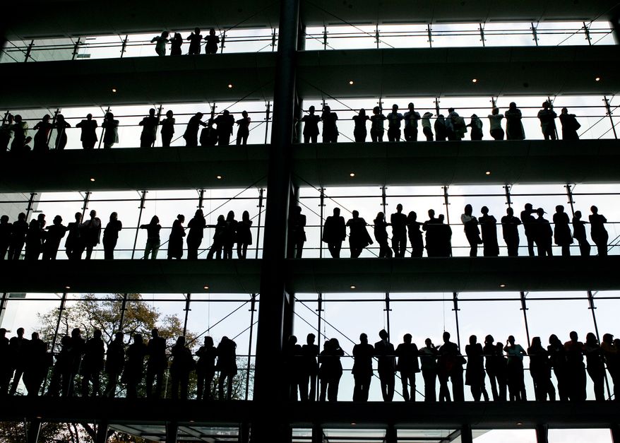 In this Oct. 30, 2007, file photo, employees are silhouetted at the Boehringer Ingelheim pharmaceutical factory in Ingelheim, central Germany. Boehringer Ingelheim has asked the Food and Drug Administration to approve its drug flibanserin for women who report a lack of sexual desire, a market that drugmakers have been targeting for more than a decade since the success of Viagra in men. Federal health regulators said Wednesday, June 16, 2010, the first pill designed to boost the female sex drive failed to make a significant impact on libido in two studies.(AP Photo/Michael Pobst, file)