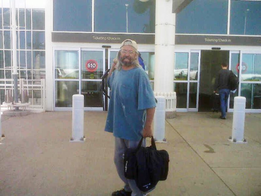 This Sunday, May 30, 2010, photograph provided by Dr. Scott Faulkner shows his brother Gary Faulkner at the Denver International Airport en route to Pakistan. (AP Photo/Dr. Scott Faulkner)