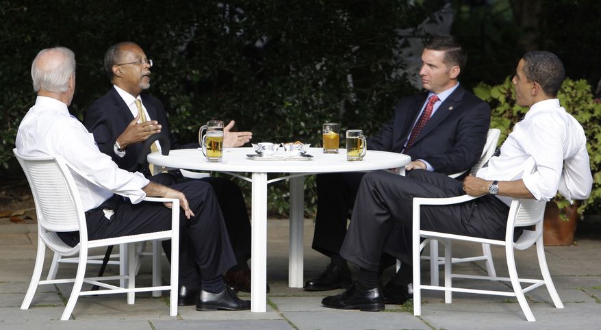 In this July 30, 2009, file photo, President Obama, right, and Vice President Joseph R. Biden Jr., left, have a beer with Harvard scholar Henry Louis Gates Jr., second from left, and Cambridge, Mass., police Sgt. James Crowley in the Rose Garden of the White House in Washington. A review of the case released Wednesday, June 30, 2010, said both Mr. Gates and Sgt. Crowley missed opportunities to "ratchet down" the situation and end things more calmly during a confrontation when Gates was arrested outside his Cambridge home in July 2009. (AP Photo/Alex Brandon, File)