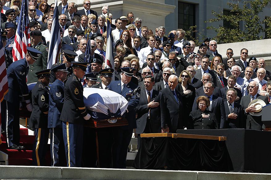 The coffin of Sen. Robert Byrd is brought down the steps at the Capitol in Charleston, W.Va., Friday, July 2, 2010. (AP Photo/Charles Dharapak)