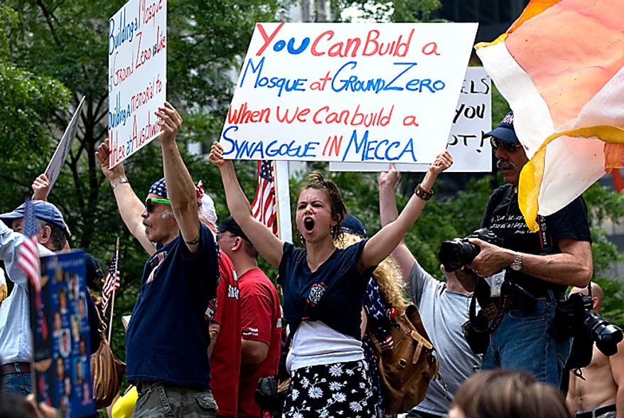 People in New York protest the proposed construction of a mosque near the World Trade Center site Sunday, June 6, 2010.