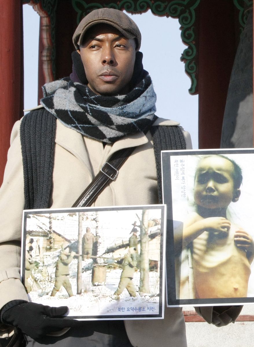 A Jan. 12, 2010, file photo shows American Aijalon Mahli Gomes, during a rally denouncing North Korean's human rights conditions at the Imjingak Pavilion, near the demilitarized zone of Panmunjom that separates the two Koreas. North Korea's official Korean Central News Agency reported Friday, July 9, 2010, that Aijalon Mahli Gomes, from Boston, attempted to commit suicide and was being treated at a hospital. (AP Photo/Ahn Young-joon, File)