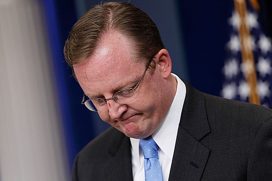 White House Press Secretary Robert Gibbs pauses as he speaks with reporters on Wednesday, July 21, 2010, at the White House in Washington, about the apparently wrongful firing of a black U.S. Agriculture Department official, Shirley Sherrod, after it appeared she had made racist remarks in unfair and heavily edited video posted on a conservative website. Mr. Gibbs says Mrs. Sherrod is owed an apology for the rush to judgement after the full video indicated those remarks were taken out of context. (AP Photo/J. Scott Applewhite)