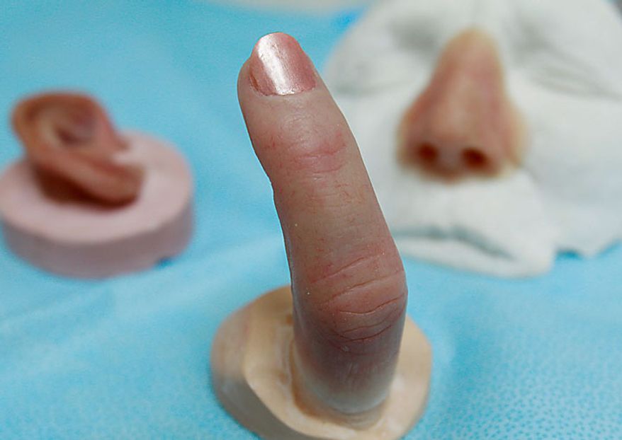 In this photo taken June 23, 2010, prosthetics are seen in a facial prosthetics lab at Wilford Hall Medical Center in San Antonio, Texas. (AP Photo/Eric Gay)