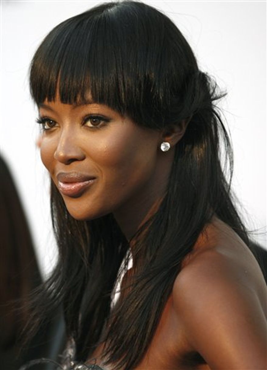 FILE - In this May 20, 2010 file photo, British model Naomi Campbell arrives for the amfAR Cinema Against AIDS benefit, during the 63rd Cannes international film festival, in Cap d'Antibes, France. Judges at the Special Court for Sierra Leone have rejected Wednesday Aug. 4, 2010 a final protest from Charles Taylor, clearing the way for model Naomi Campbell to testify at his war crimes trial. Taylor's lawyer had objected to Campbell testifying, arguing that the prosecution had not provided a summary of her likely testimony.(AP Photo/Matt Sayles, File)