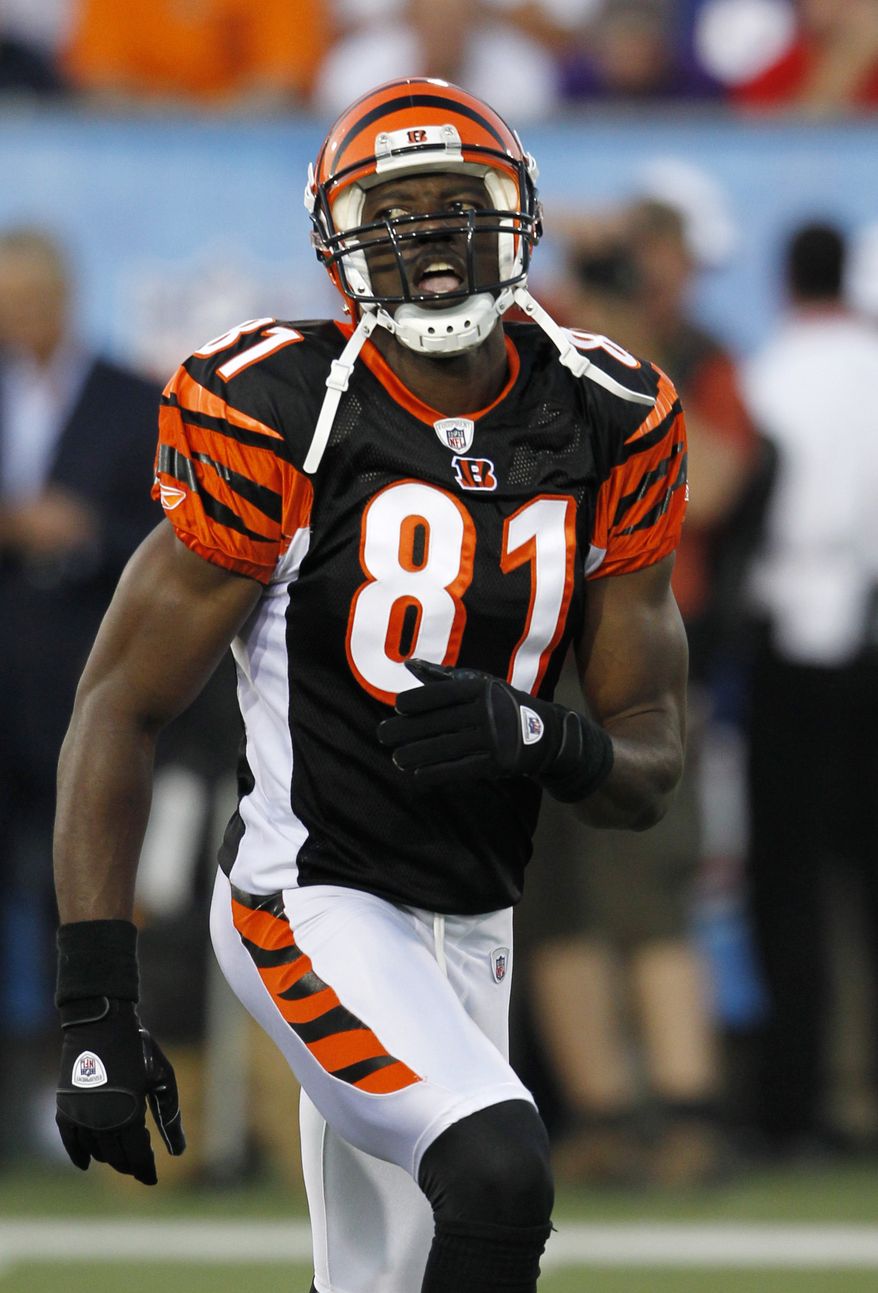 ASSOCIATED PRESS Cincinnati Bengals wide receiver Terrell Owens runs back to the line of scrimmage in the first quarter of the Hall of Fame NFL football game against the Dallas Cowboys Sunday, Aug. 8, 2010, in Canton, Ohio.
