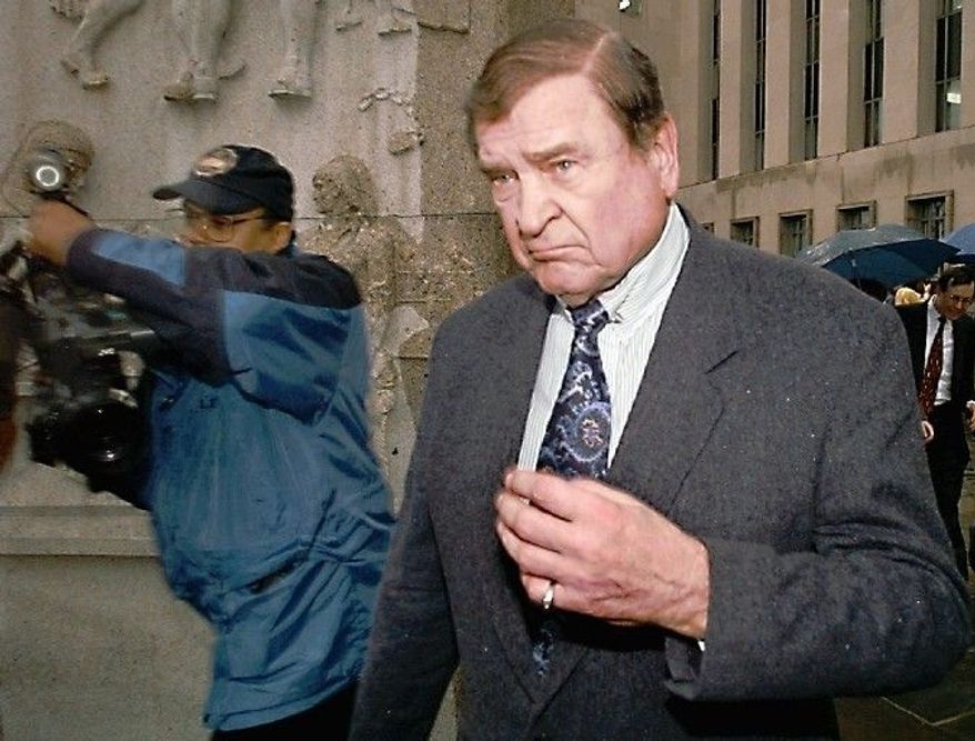 ASSOCIATED PRESS PHOTOGRAPHS
Former Rep. Dan Rostenkowski, Illinois Democrat, departs a federal courthouse in Washington on April 9, 1996, after pleading guilty to two counts of mail fraud. He was sternly told by a judge that he brought "a measure of disgrace" to Congress. Rostenkowski was immediately sentenced to 17 months in prison and ordered to pay a $100,000 fine.