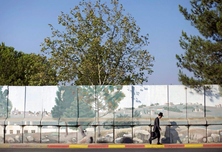 This wall helped protect the Jewish neighborhood of Gilo for nine years from the Palestinian village of Beit Jalla. (Associated Press)