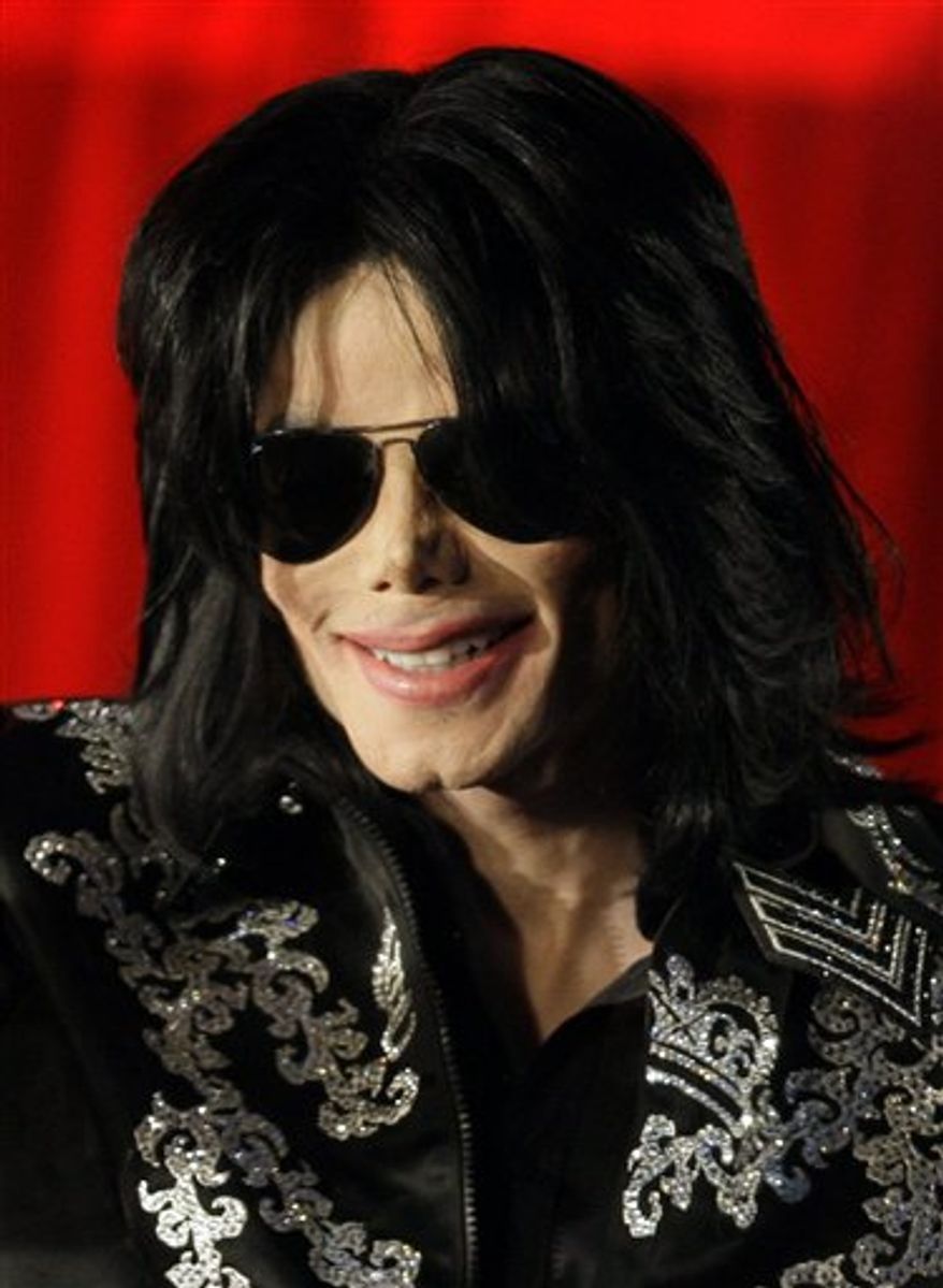 FILE - In this March 5, 2009 file photo, US singer Michael Jackson is shown at a press conference in London. (AP Photo/Joel Ryan, file)