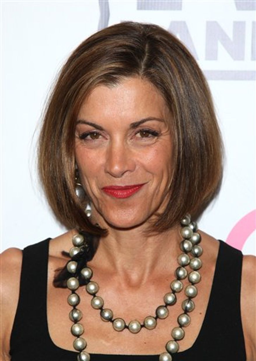 FILE - In this June 14, 2010 file photo, actress Wendie Malick attends the TV Land screening of "Hot in Cleveland" in New York. (AP Photo/Peter Kramer, file)