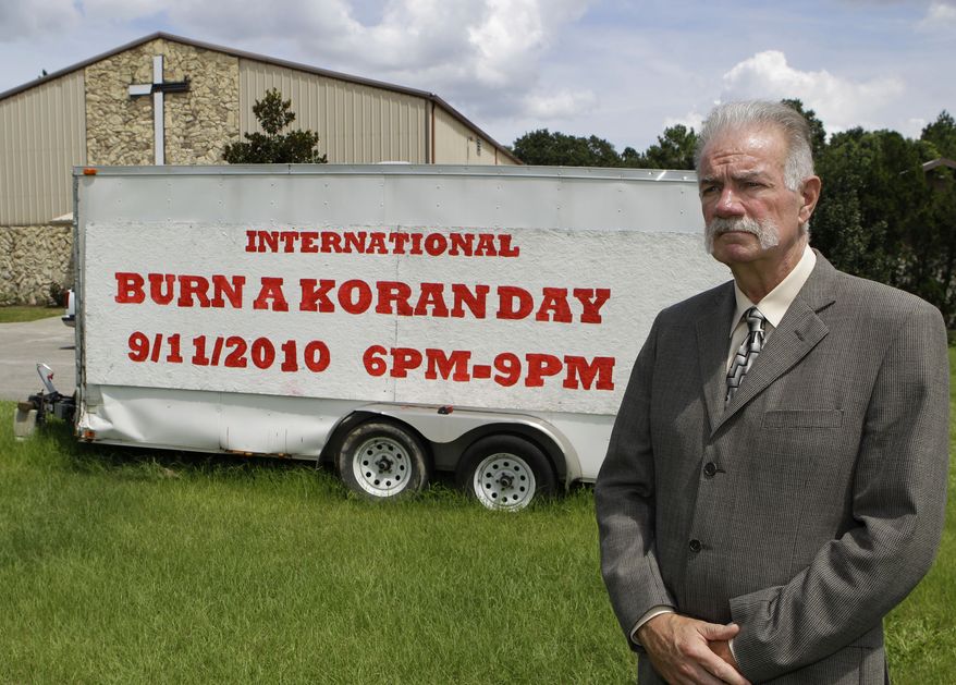 UP IN FLAMES: The Rev. Terry Jones at the Dove World Outreach Center in Gainesville, Fla., plans to burn copies of the Koran to mark the anniversary of Sept. 11 terrorist attacks. (Associated Press)