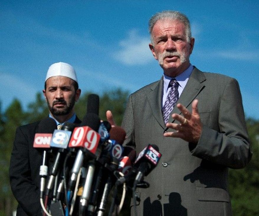 credit
three lines three lines three lines three lines three lines three lines three lines three lines three lines three lines three lines three lines three lines three lines three lines three lines three lines three lines.
Pastor Terry Jones of the Dove World Outreach Center speaks to the media as Imam Muhammad Musri of the Islamic Society of Central Florida looks on at left, Thursday, Sept. 9, 2010, in Gainesville, Fla. (AP Photo/Phil Sandlin)