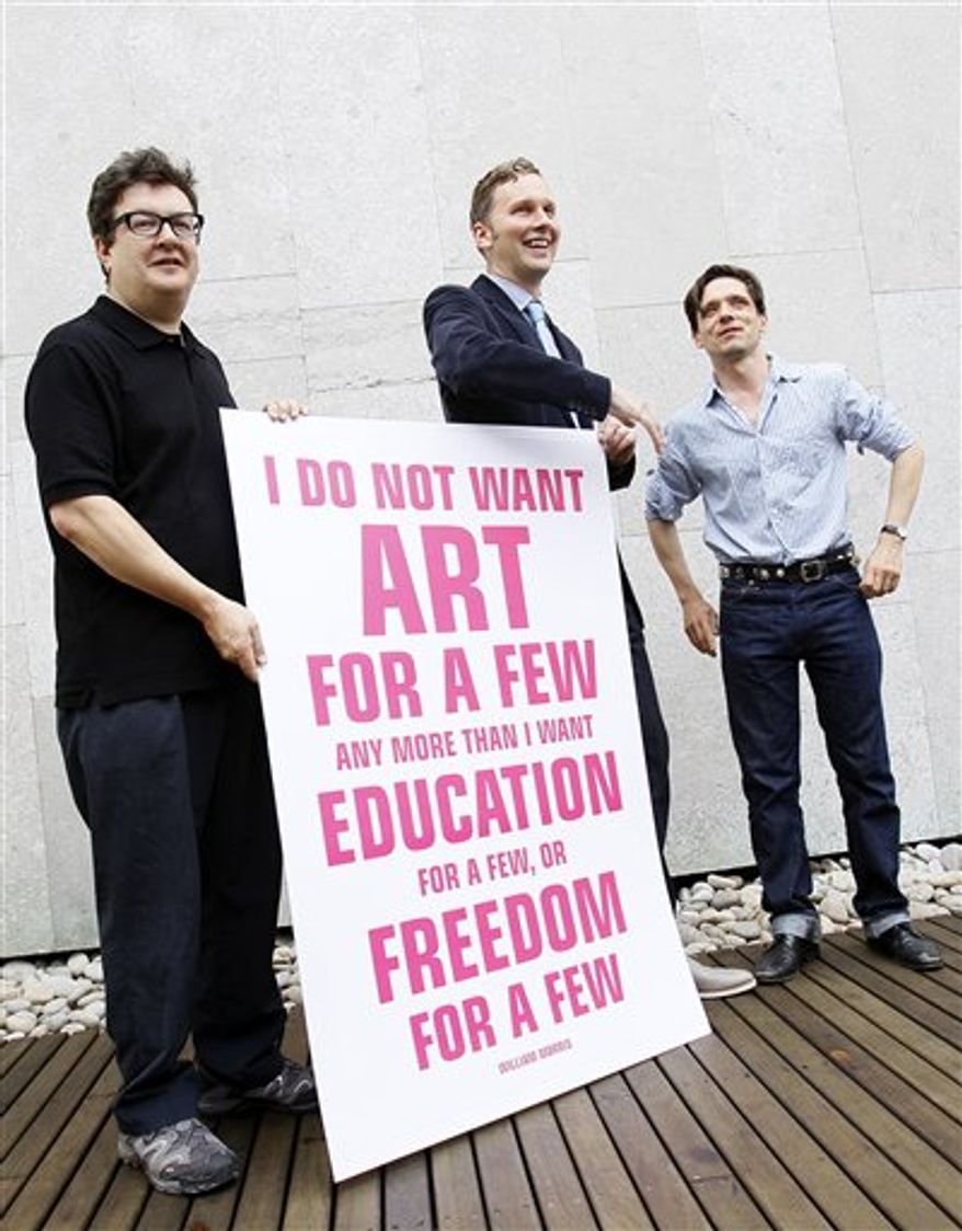 British artist Jeremy Deller, poses for the media as they launch a campaign to lobby against the Governments proposed 25 per cent cuts in arts funding, in London Friday, Sept. 10. 2010. (AP Photo/Alastair Grant)