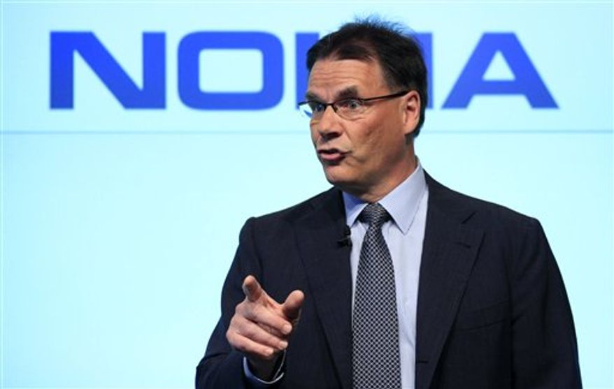 FILE - A Monday, May 24, 2010 photo from files of Olli-Pekka Kallasvuo, CEO of Nokia,as he talks during a news conference in New York. Nokia Corp. will replace CEO Olli-Pekka Kallasvuo with Stephen Elop from Microsoft on Sept. 21, the world's largest handset maker said Friday, Sept. 10, 2010, as it struggles to keep pace with smaller and more innovative rivals, particularly in the smartphone market. With Nokia stock down more than 20 percent this year due to two profit warnings, the Nokia veteran Kallasvuo had come under increasing pressure amid speculation he would be ousted. (AP Photo/Mark Lennihan, File)