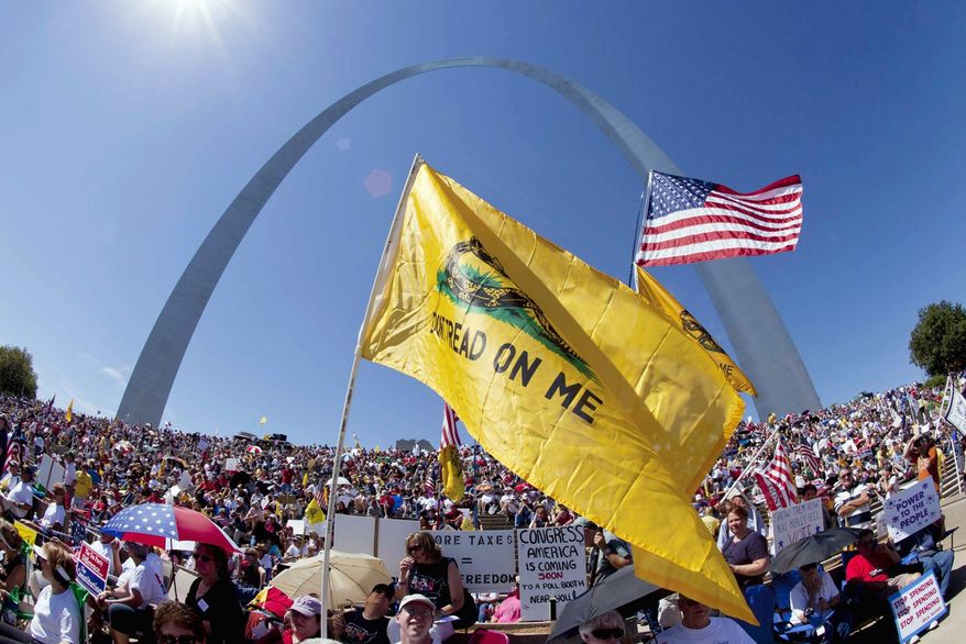 Tea partyers gather on the steps of the Gateway Arch in St. Louis in September 2010 for the "Gateway to November" rally hosted by the St. Louis Tea Party and Tea Party Patriots. (Associated Press)
