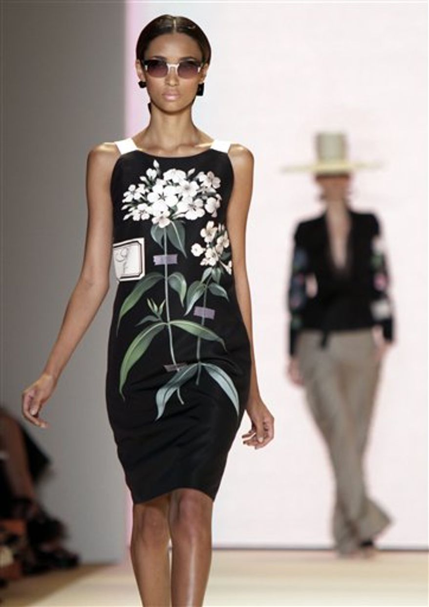The spring 2011 collection of designer Carolina Herrera is modeled during Fashion Week in New York, Monday, Sept. 13, 2010. (AP Photo/Richard Drew)