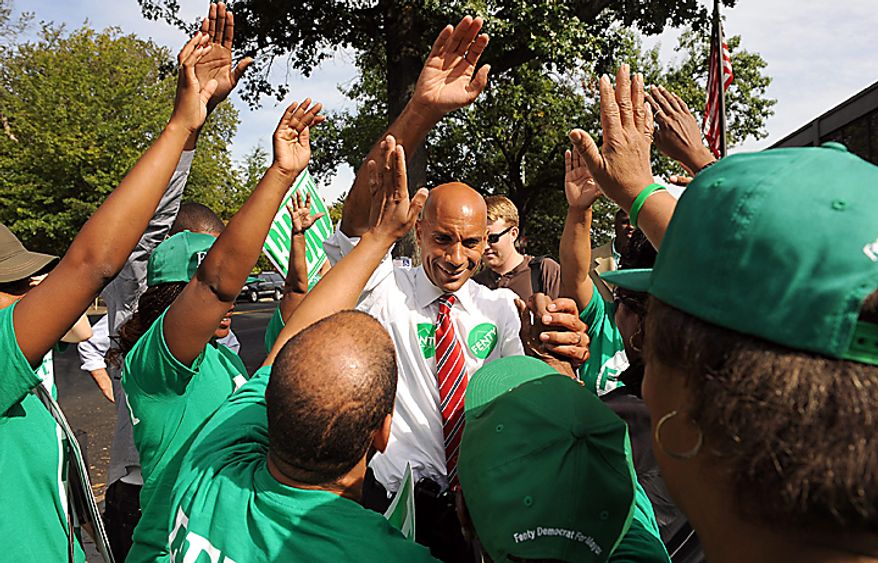 Washington D.C. Mayor Adrian Fenty talks to supporters outside of a polling place during primary voting in Washington on September 14, 2010. Fenty is in a heated race with challenger Vincent Gray. UPI/Roger L. Wollenberg