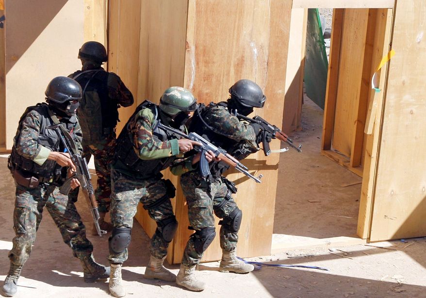 Soldiers from the anti-terrorism force of the Yemeni Defense Ministry are training, with U.S. military assistance, to take on a more diverse, independent and scattered al Qaeda network. (Associated Press)