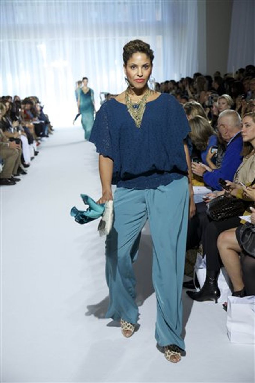 In this photo provided by OneStopPlus.com, the OneStopPlus spring 2011 collection is modeled during Fashion Week in New York, Wednesday, Sept. 15, 2010. (AP Photo/OneStopPlus.com) NO SALES
