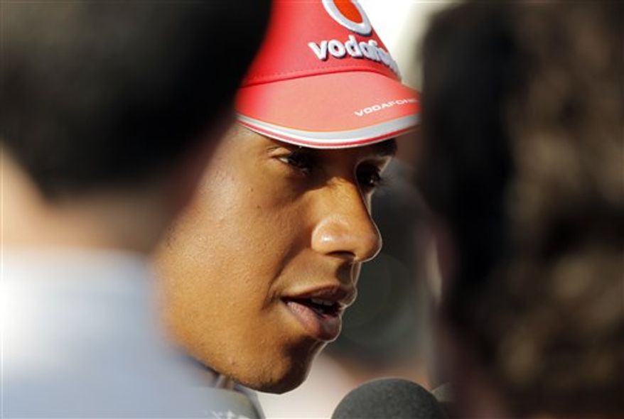 McLaren Formula One driver Lewis Hamilton of Britain speaks after a press conference at the Suzuka Circuit, in central Japan, Thursday, Oct. 7, 2010. The Japanese Grand Prix will be held Sunday. (AP Photo/Junji Kurokawa)