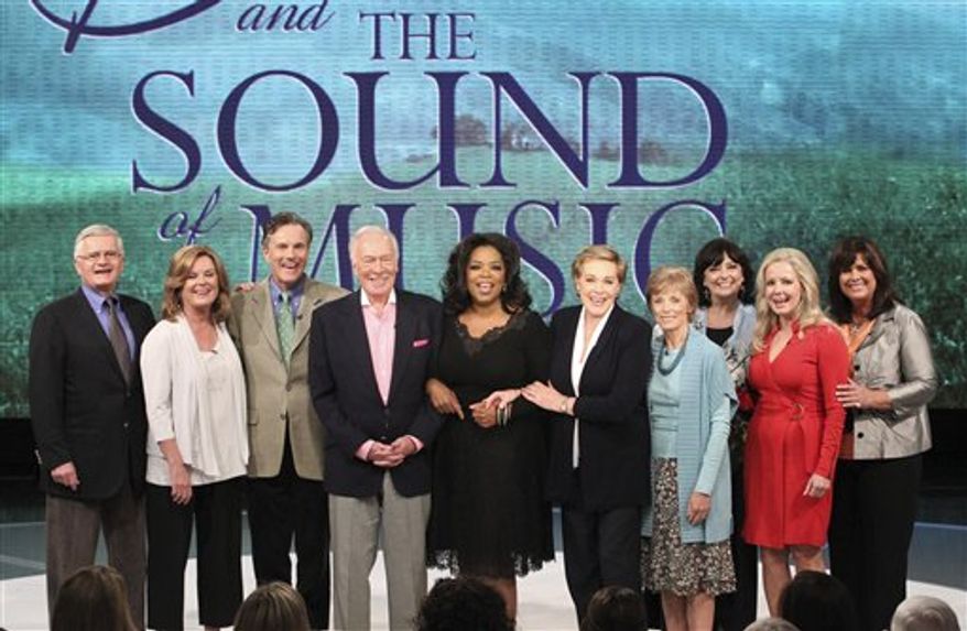 This photo taken Sept. 23, 2010 and provided by Harpo Productions Inc., shows members of the cast of "The Sound of Music" reuniting for the first time in 45 years during taping of "The Oprah Winfrey Show" at Harpo Studios in Chicago. Pictured from left are: Duane Chase "Kurt", Heather Menzies-Urich "Louisa", Nicholas Hammond "Friedrich", Christopher Plummer, Oprah Winfrey, Julie Andrews, Charmian Carr "Liesl," Angela Cartwright "Brigitta", Kym Karath "Gretl", and Debbie Turner "Marta." The show will nationally on Thursday, Oct. 28, 2010. (AP Photo/Harpo Productions Inc., George Burns)