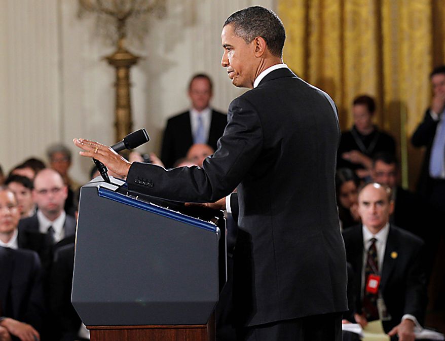 President Barack Obama gestures as he moves off stage at the conclusion of his news conference in the East Room of the White House in Washington, Wednesday, Nov. 3, 2010. (AP Photo/Pablo Martinez Monsivais)