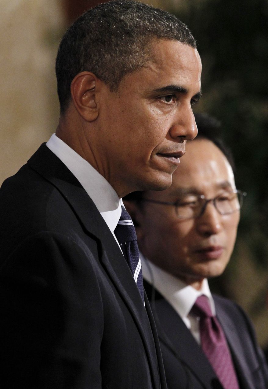 **FILE** President Obama and South Korean President Lee Myung-bak hold a joint news conference at Blue House in Seoul, South Korea, on Nov. 11, 2010. (Associated Press)