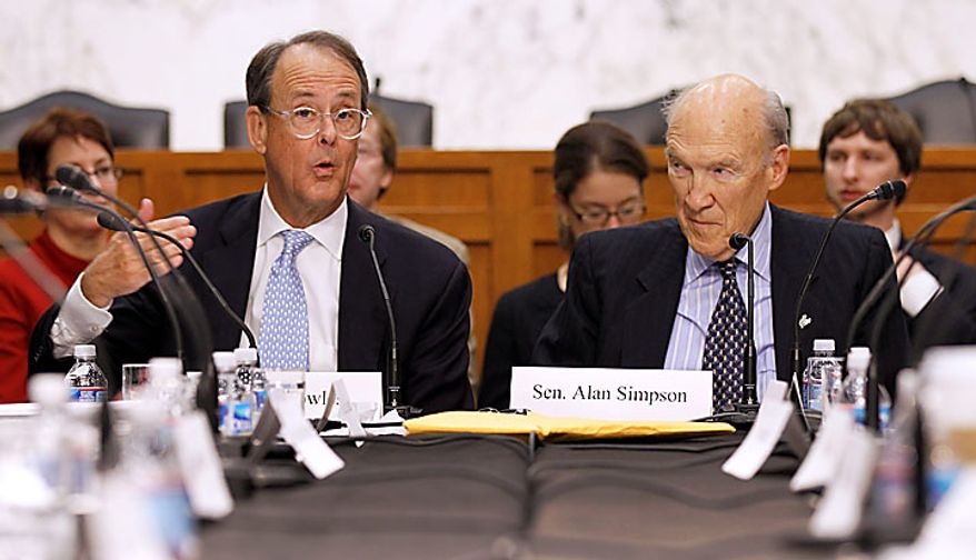 Debt Commission co-chairmen Erskine Bowles, left, and former Wyoming Sen. Alan Simpson, speak during a meeting of the commission on Capitol Hill in Washington, Wednesday, Dec. 1, 2010. (AP Photo/Alex Brandon)