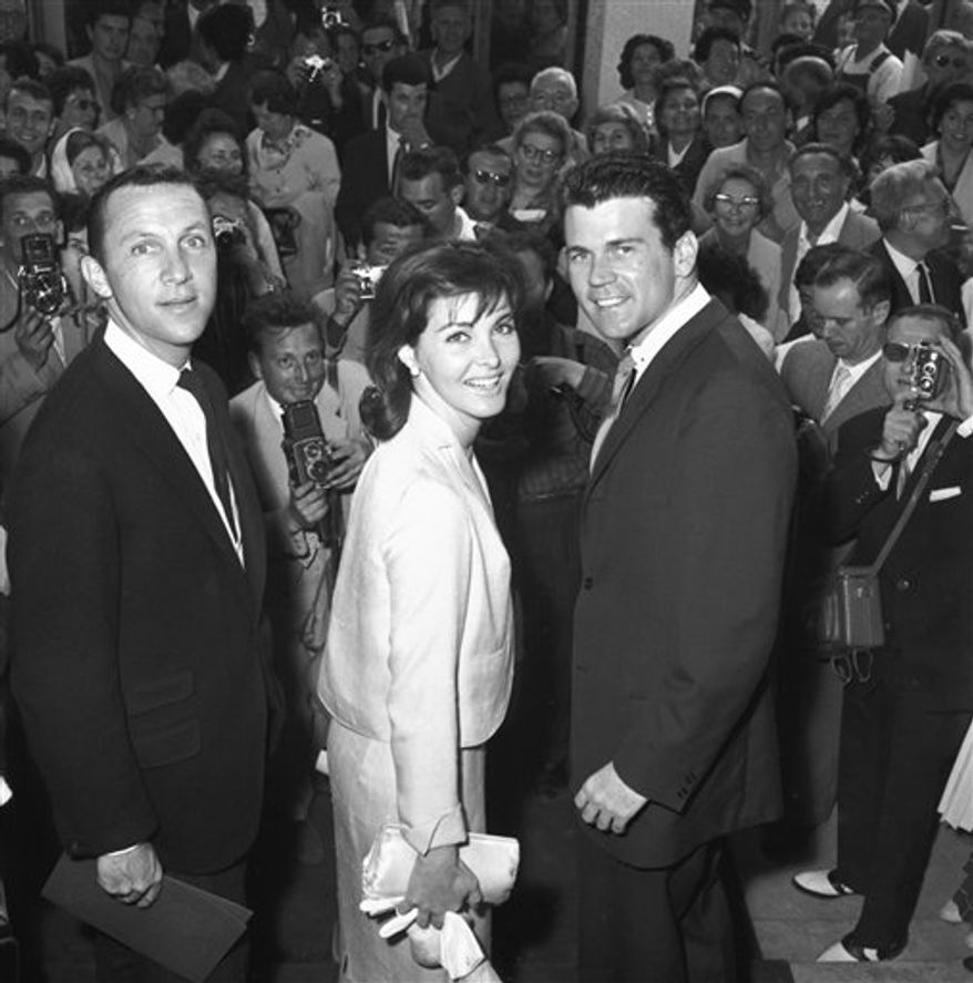 FILE - In this May 1961 file photo, director Irvin Kershner, left, and actors Cindi Wood and Don Murray arrive at the Festival Palace at the Cannes Festival in Cannes, France, as their film "Hoodlum Priest," was presented at the festival. The agent for Kershner says the director of the "Star Wars" sequel "The Empire Strikes Back" has died at age 87. Agent Derek Maki says in an e-mail to The Associated Press on Monday, Nov. 29, 2010, that Kershner died during the weekend, but no further details are available. (AP Photo, File) NO SALES