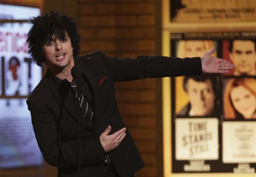 FILE - In this June 13, 2010 photo, Billie Joe Armstrong of the rock band Green Day appears onstage at the 61st Annual Tony Awards in New York. (AP Photo/Richard Drew, File)