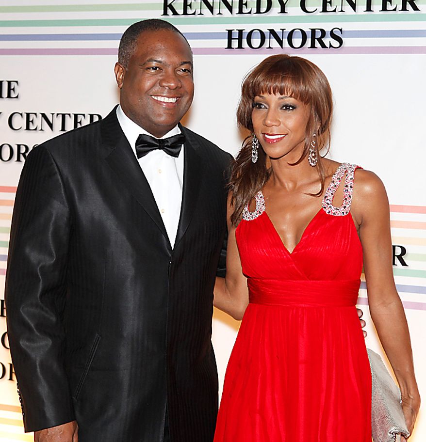 Rodney Peete, left, and Holly Robinson Peete walk the red carpet at the Kennedy Center Honors in Washington on Sunday, Dec. 5, 2010. (AP Photo/Jacquelyn Martin)