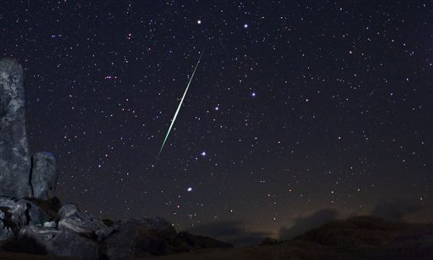 In this picture provided by Wally Pacholka of AstroPics.com, a Geminid fireball explodes over the Mojave Desert in the Jojave Desert, Calif. on Dec. 13, 2009. In mid-December 2010, the Geminid meteor shower will make its annual appearance, just in time for Christmas. Astronomers consider it the best meteor shower of 2010, with more than 100 meteors streaking through the night sky every hour. (AP Photo/AstroPics.com, Wally Pacholka) MANDATORY CREDIT: ASTROPICS.COM, WALLY PACHOLKA; NO SALES; EDITORIAL USE ONLY IN CONJUNCTION WITH THE 2010 GEMINID METEOR SHOWER STORIES