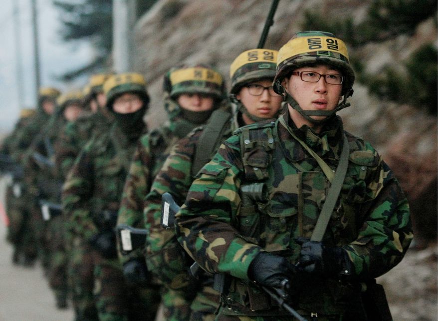 ASSOCIATED PRESS
ON PATROL: The South Korean military patrols on Yeonpyeong Island on Tuesday. Yeonpyeong straddles the disputed maritime border between the Koreas.
