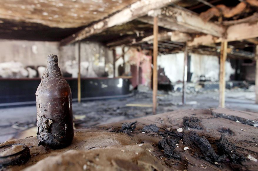 A once-popular nightclub sits abandoned in Cuidad Juarez. The owner said he closed the bar after it was set on fire three times because he refused to pay extortion fees to cartel enforcers. (Associated Press)