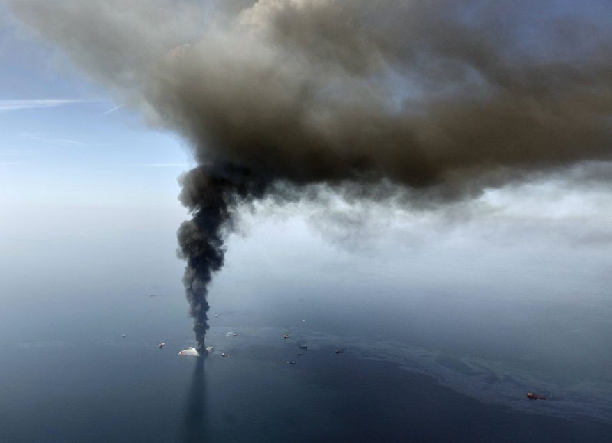 The Deepwater Horizon oil rig burns in the Gulf of Mexico on April 21, 2010. (AP Photo/Gerald Herbert)