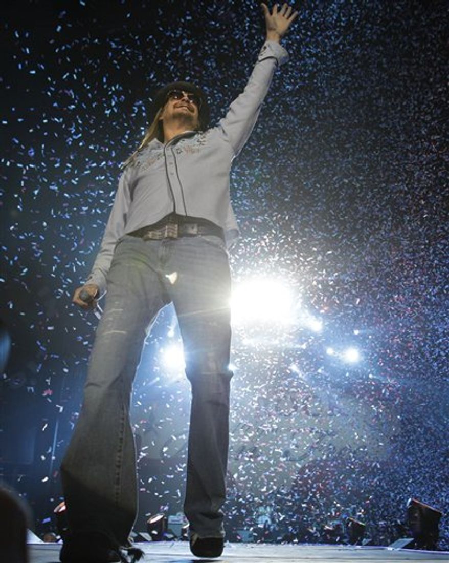 Kid Rock performs at Ford Field in Detroit, Saturday, Jan. 15, 2011. (AP Photo/Carlos Osorio)