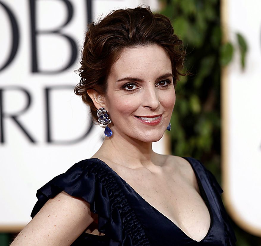 Tina Fey arrives for the Golden Globe Awards Sunday, Jan. 16, 2011, in Beverly Hills, Calif. (AP Photo/Matt Sayles)