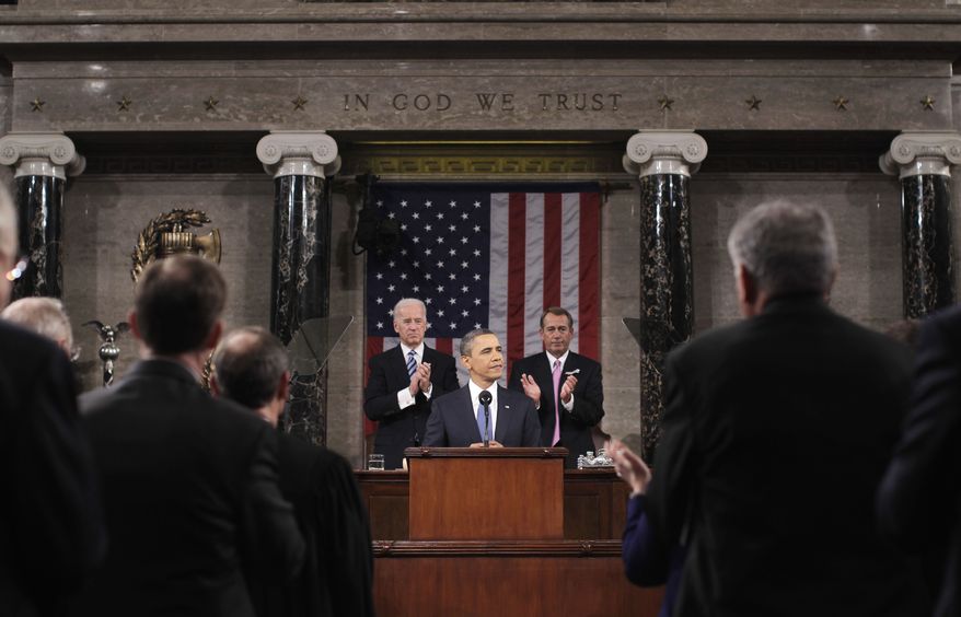 President Barack Obama delivers his State of the Union address on Capitol Hill in Washington, Tuesday, Jan. 25, 2011. Vice President Joe Biden and House Speaker John Boehner of Ohio applaud at rear. (AP Photo/Pablo Martinez Monsivias, Pool)