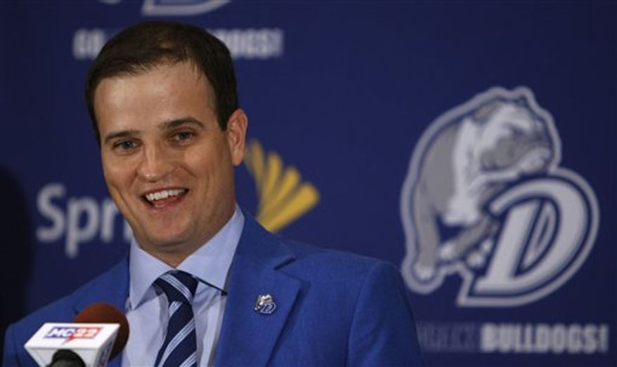 PGA golfer Zach Johnson speaks during a news conference after receiving an award from his alma mater Drake University, Tuesday, Jan. 25, 2011, in Des Moines, Iowa. (AP Photo/Charlie Neibergall)