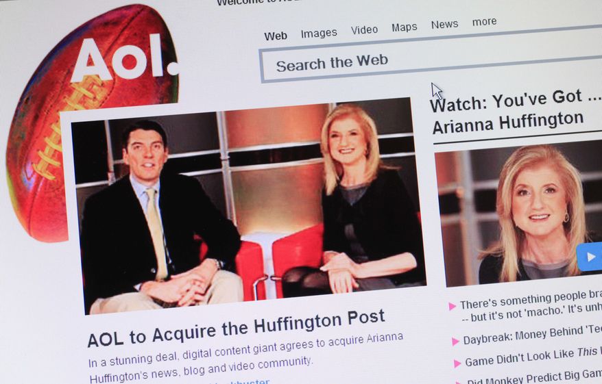 Headlines on AOL's website on Monday, Feb. 7, 2011, announce that the online company is buying online news hub Huffington Post. The $315 million deal represents a bold bet on the future of online news. (AP Photo/Mark Lennihan)