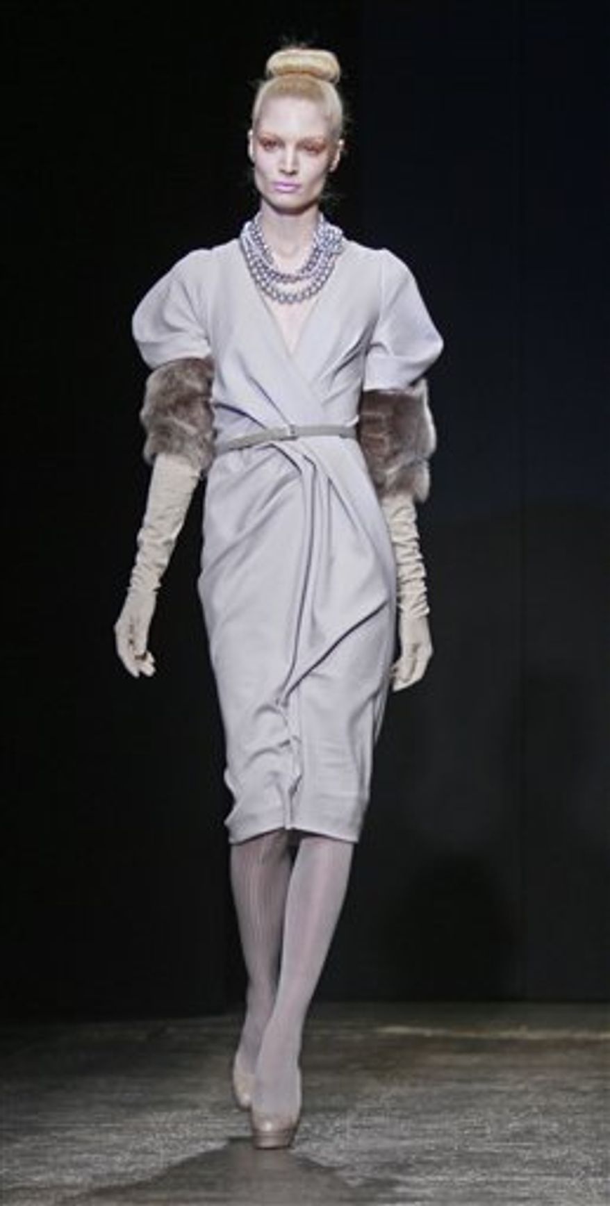 Fashion from the fall 2011 collection of Donna Karan is modeled on Monday, Feb. 14, 2011 in New York. (AP Photo/Bebeto Matthews)