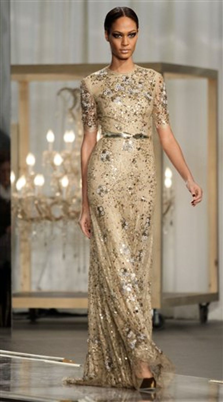 Fashion from the Fall 2011 collection of Jason Wu is modeled on Friday, Feb. 11, 2011 in New York. (AP Photo/Bebeto Matthews)